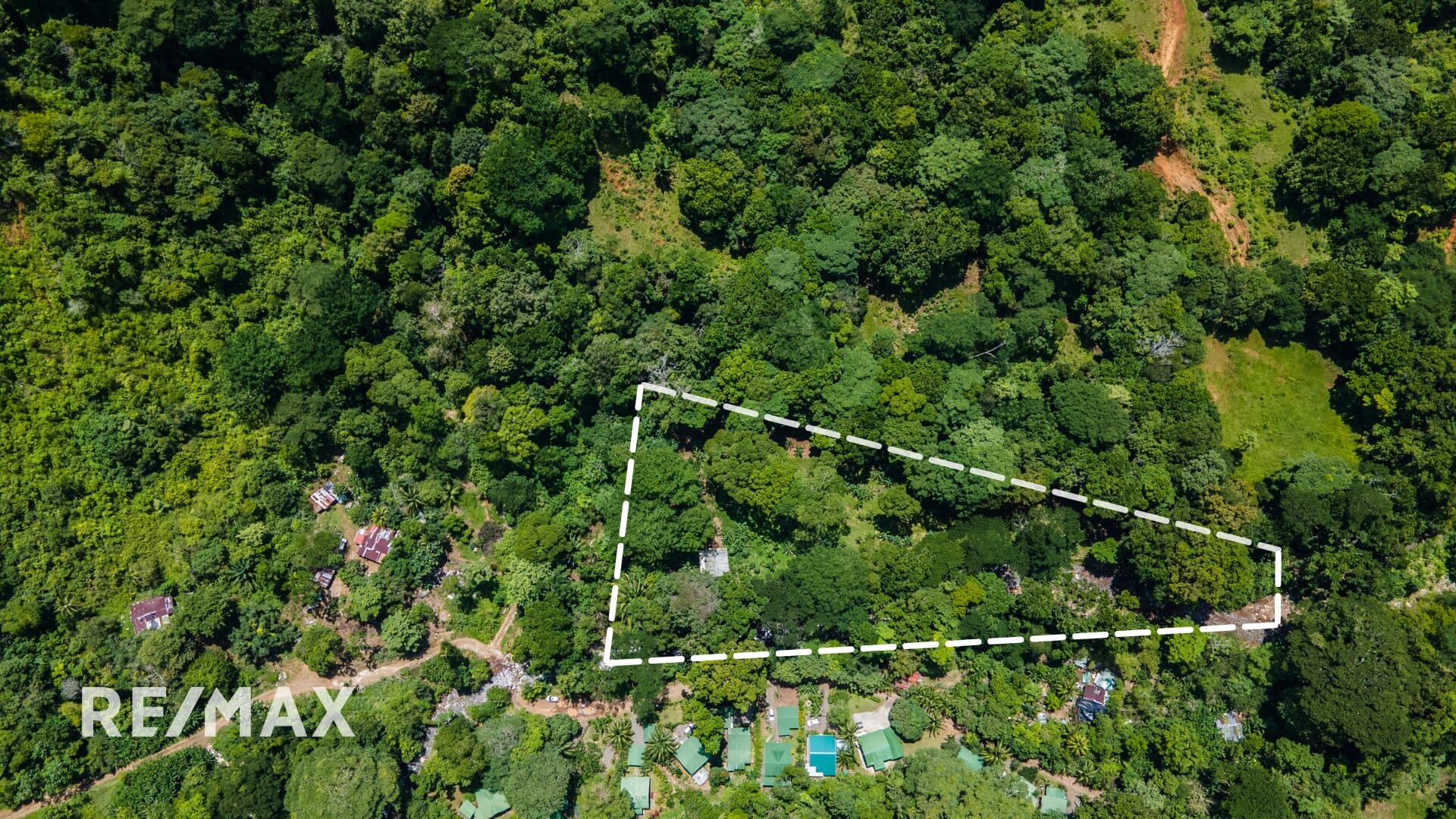 Enchanting Riverside Lot in Playa Hermosa with Waterfalls and Abundant Wildlife