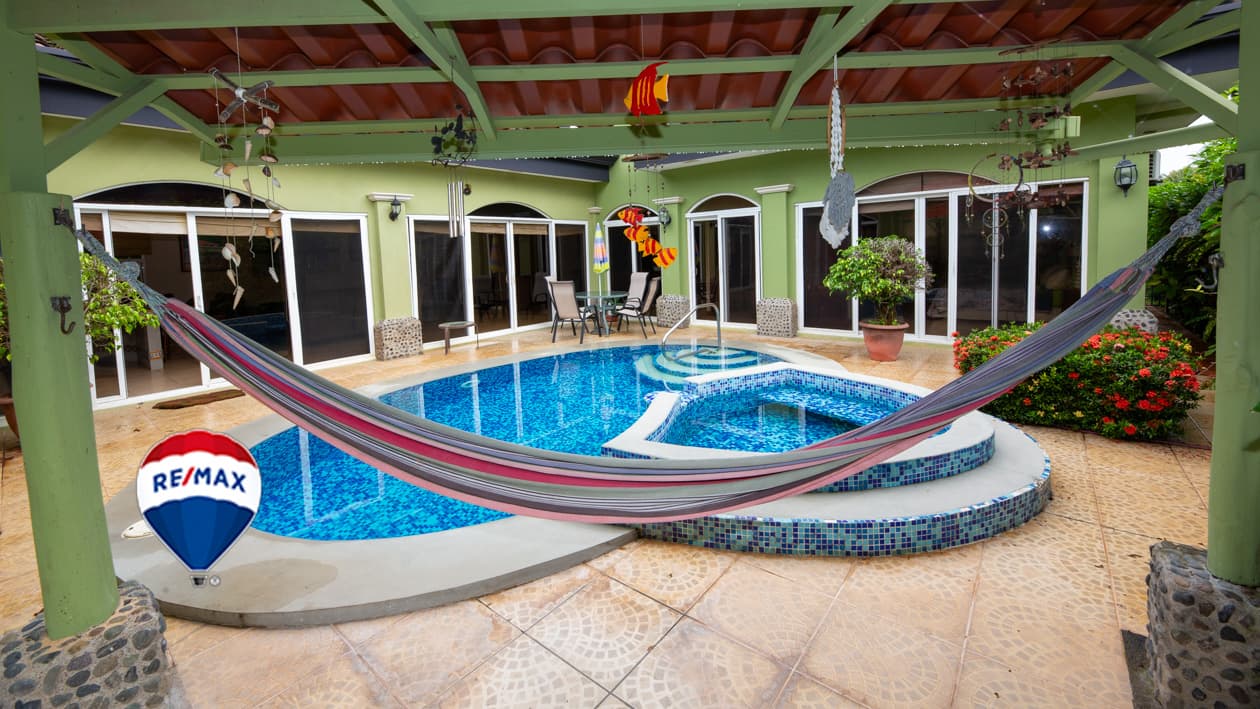 Costa Del Sol | Pool and Patio | Garage, photo 10